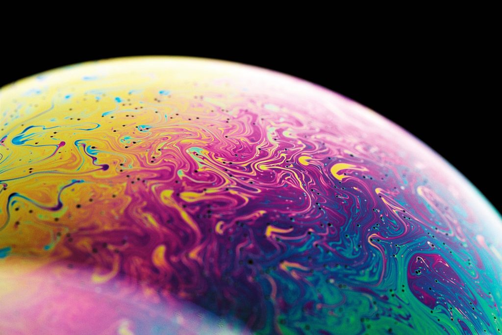Soap bubble with a mixture of colours. Resembles a mixture of chemicals to represent research.